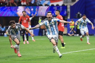 Argentina's Lionel Messi celebrates scoring against Egypt.