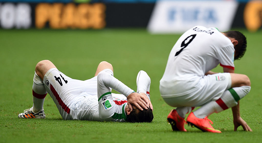 https://d.ibtimes.com/en/full/4651169/iranian-soccer-players-react-after-losing-bosnia-hercegovina.jpg