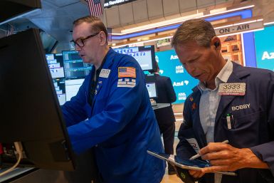 Traders work the floor of the New York Stock Exchange.