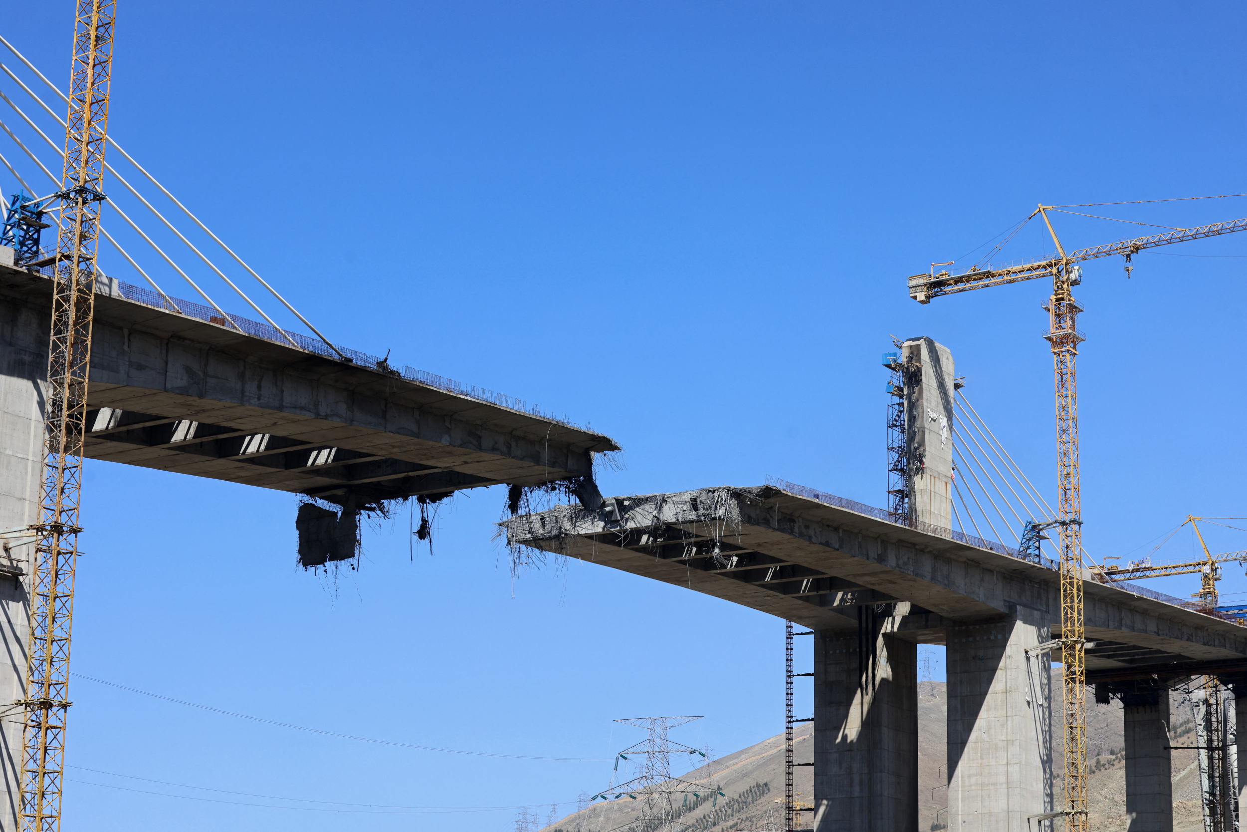 https://d.ibtimes.com/en/full/4651405/b1-bridge-destroyed-strike-karaj-iran.jpg