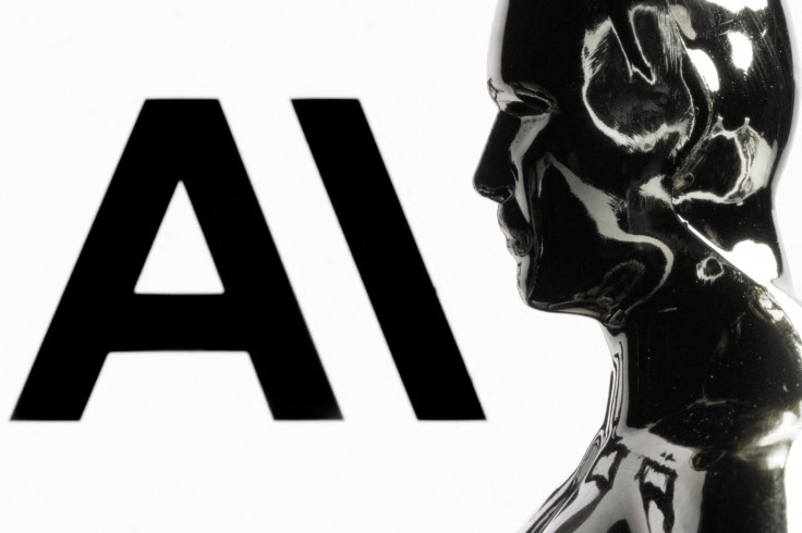 a figurine in front of the logo of Anthropic