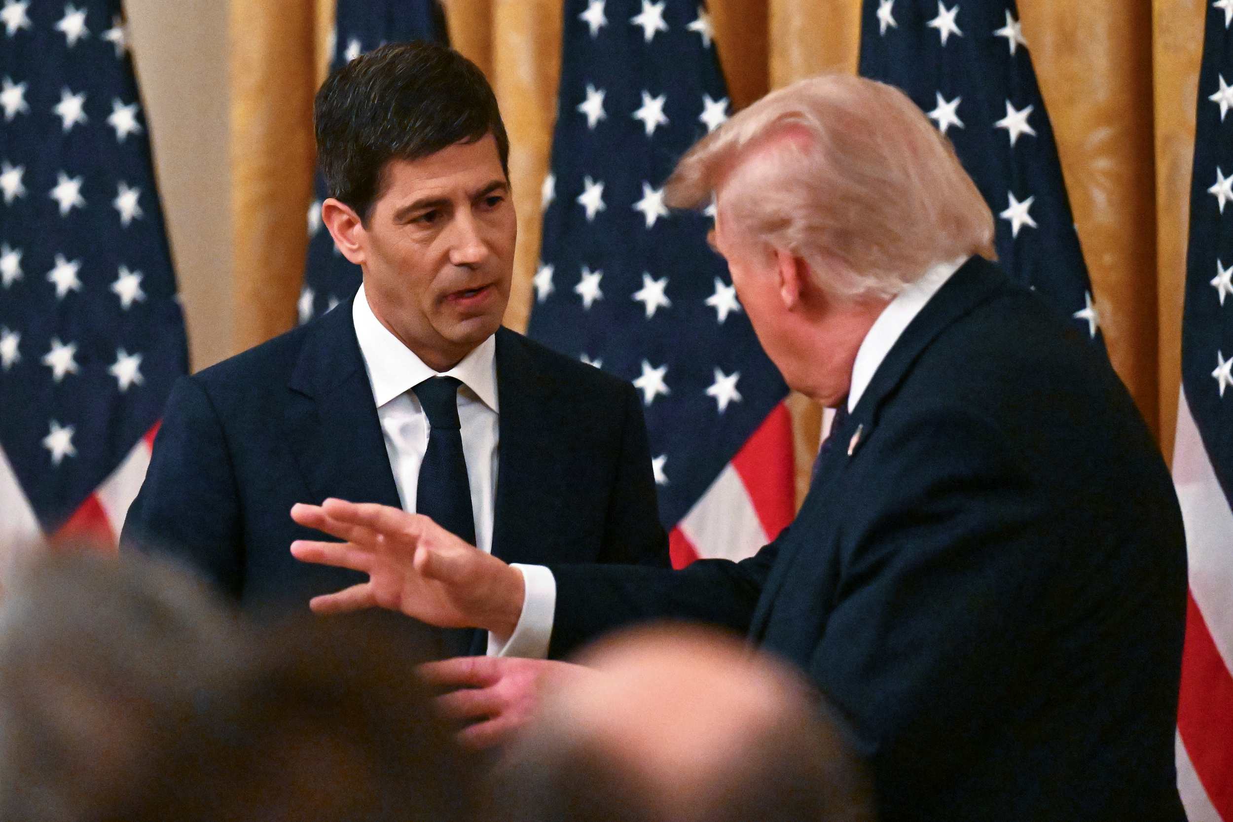 https://d.ibtimes.com/en/full/4652580/us-president-donald-trump-speaks-kevin-warsh.jpg