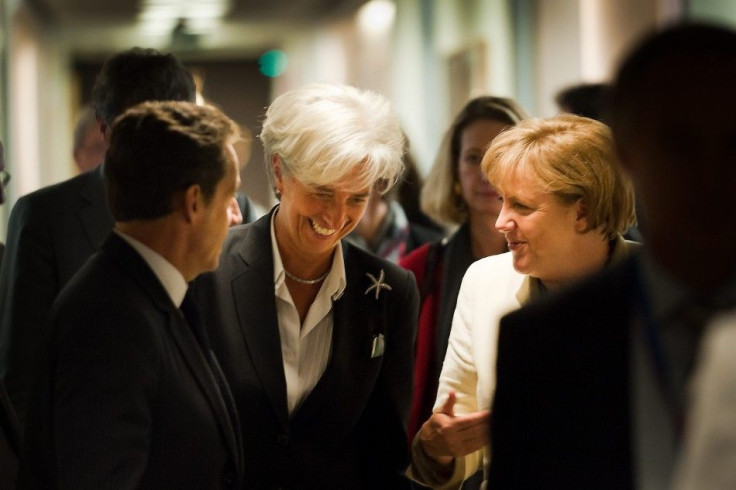 German Chancellor Merkel IMF managing director Lagarde and French President Sarkozy arrive for a meeting in Brussels