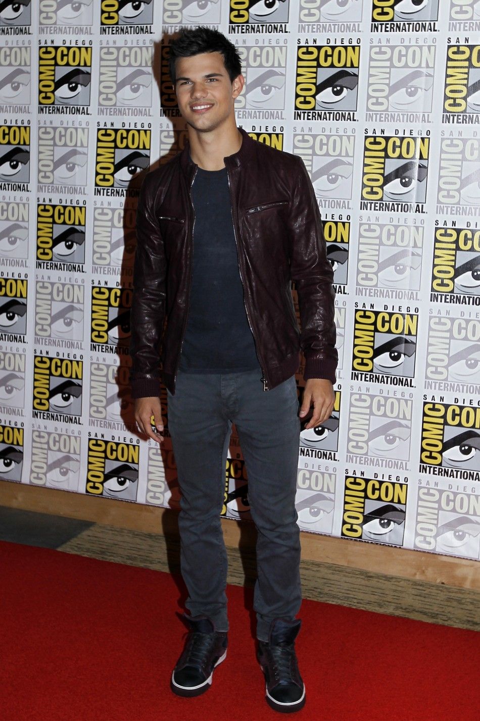 Taylor Lautner poses to promote quotBreaking Dawnquot from the Twilight Saga at Comic Con in San Diego