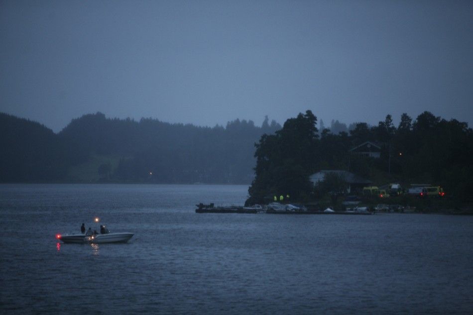 Emergency services are seen on Utoeya island