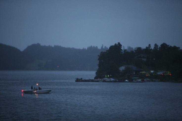 Emergency services are seen on Utoeya island