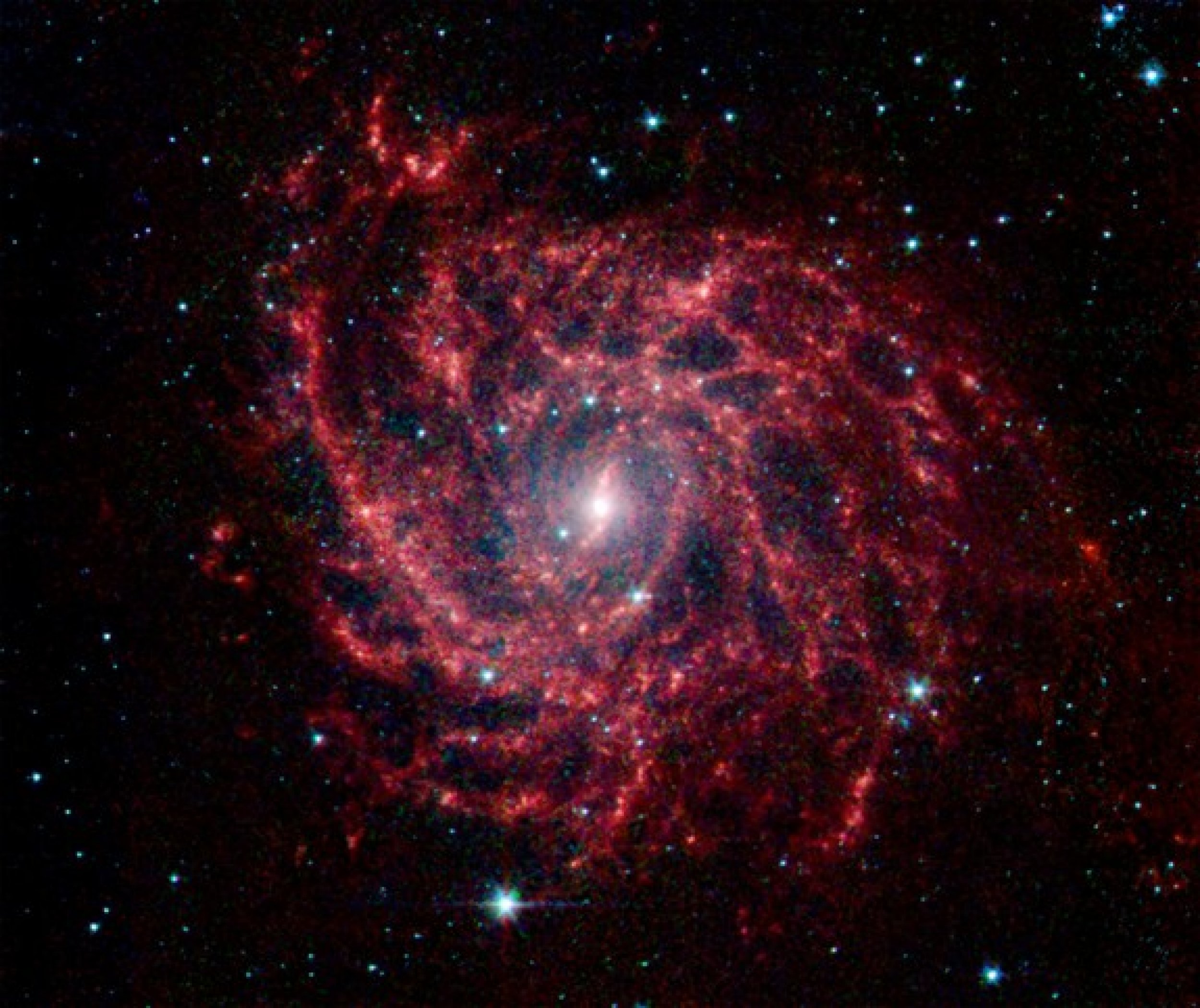 Spiral Galaxy Glows Like a Cosmic Spider Web