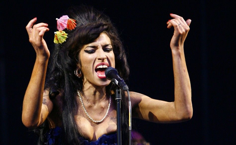 British singer Amy Winehouse performs at the Glastonbury Festival 2008 in Somerset in south west England June 28, 2008
