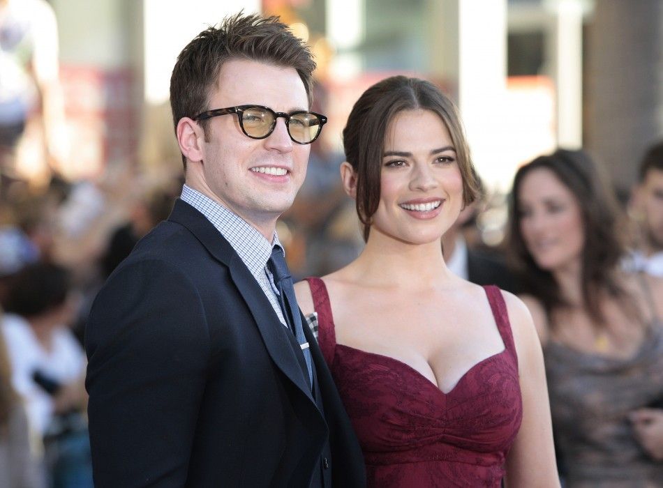 Evans and Atwell pose as they arrive at the quotCaptain America The First Avengerquot film premiere in Hollywood