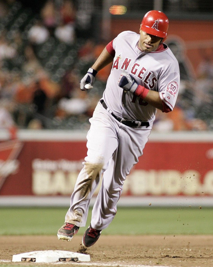 Vernon Wells of the Angels rounds the bases after hitting a grand slam against the Orioles in Baltimore