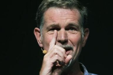 Netflix CEO Reed Hastings gestures while speaking at the Facebook f8 Developers Conference in San Francisco September 22, 2011.