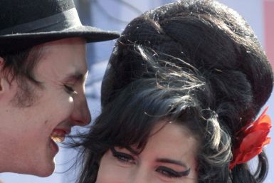 Singer Amy Winehouse (R) and husband Blake Fielder-Civil