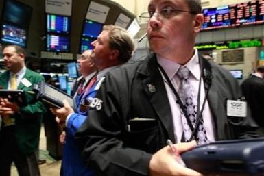 US Traders work on the floor of the New York Stock Exchange