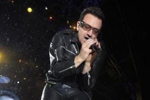 Bono, lead singer of Irish band U2, performs