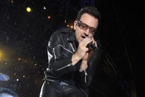 Bono, lead singer of Irish band U2, performs
