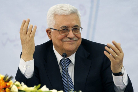Palestinian President Mahmoud Abbas gestures during a PLO central committee meeting in Ramallah