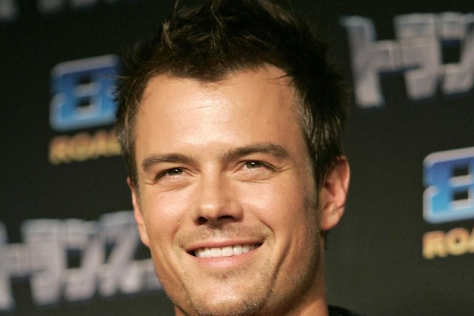 Actor Duhamel smiles for photographers during a news conference for the movie 'Transformers' in Tokyo.