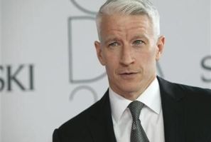 Anderson Cooper poses on the red carpet at the CFDA Fashion awards at the Lincoln Center's Alice Tully Hall in New York City