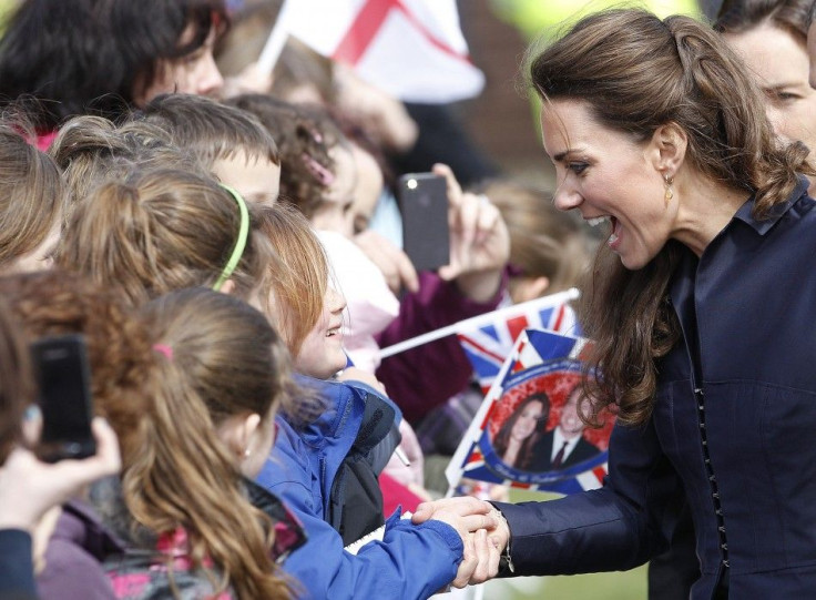 Kate Middleton talks to children