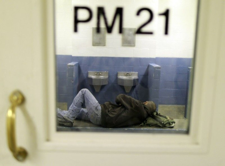 An inmate lies in his cell at the Orange County jail in Santa Ana, California 