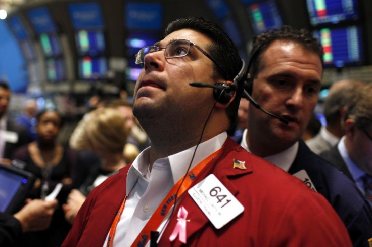 Traders work on the main trading floor of the New York Stock Exchange