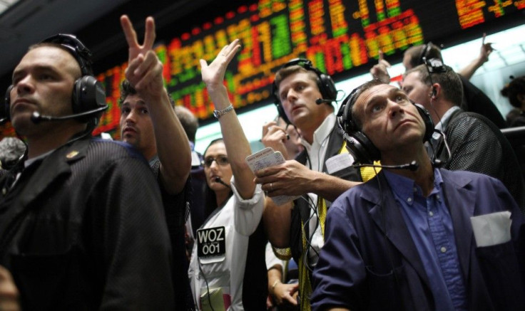 Traders work in the Euro Dollar pit at the CME Group in Chicago