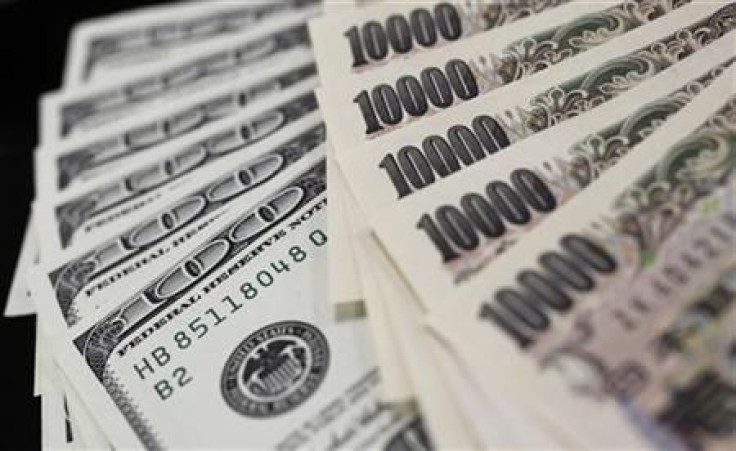 A picture illustration shows U.S. 100 dollar bank notes and Japanese 10,000 yen notes taken in Tokyo