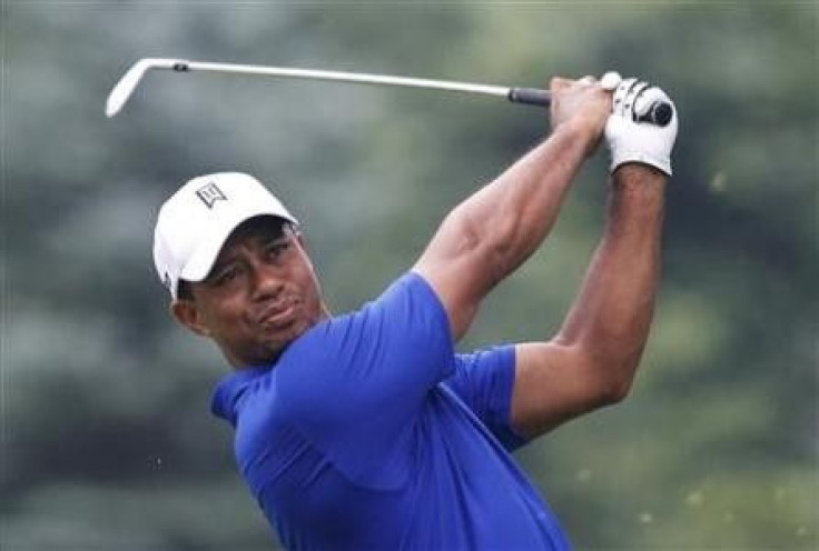 Tiger Woods of the U.S. tees off on the seventh hole during the third round of the WGC Bridgestone Invitational PGA golf tournament at Firestone Country Club in Akron