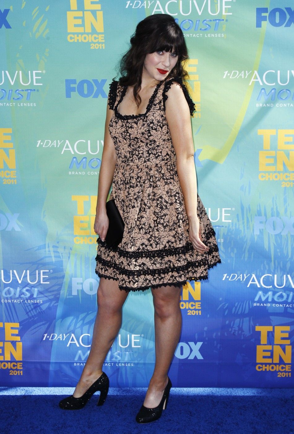 Actress Deschanel arrives at the Teen Choice Awards in Los Angeles