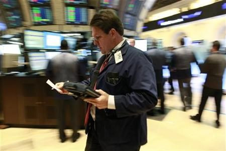 Traders work on the floor of the New York Stock Exchange