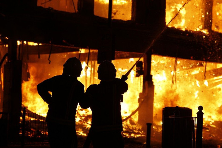 Firefighters putting out the fire 