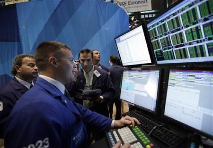 Traders work on the floor of the New York Stock Exchange