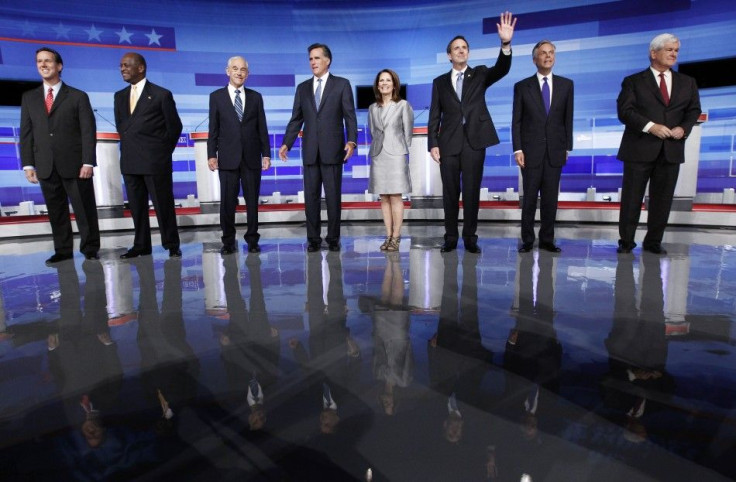 U.S. Republican presidential candidates gather before the start of their debate in Ames