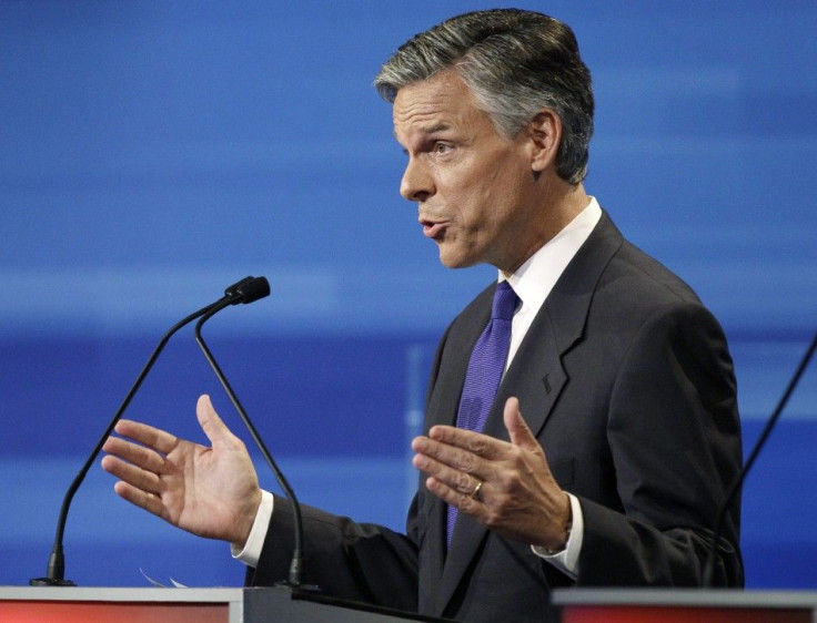 U.S. Republican presidential candidate Jon Huntsman gestures during the Republican presidential debate in Ames