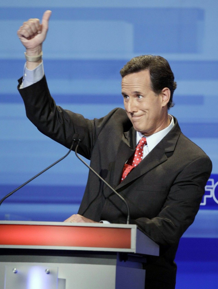U.S. Republican presidential candidate Rick Santorum gestures during the Republican presidential debate in Ames