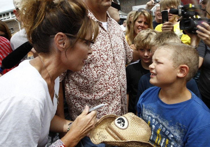 Former Governor of Alaska Sarah Palin greets people during a visit to the Iowa State Fair in Des Moines