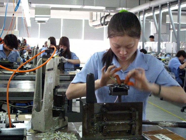 Workers at Amphenol factory weave intricate cables for western brands in China&#039;s Guangzhou