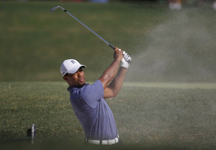 Tiger Woods of the U.S. hits from a bunker on the 13th hole during the second round of the 93rd PGA Championship golf tournament at the Atlanta Athletic Club in Johns Creek