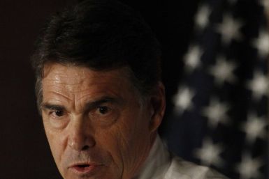U.S. Republican presidential candidate Texas Governor Rick Perry speaks at the Republicans of Black Hawk County Dinner in Waterloo, Iowa