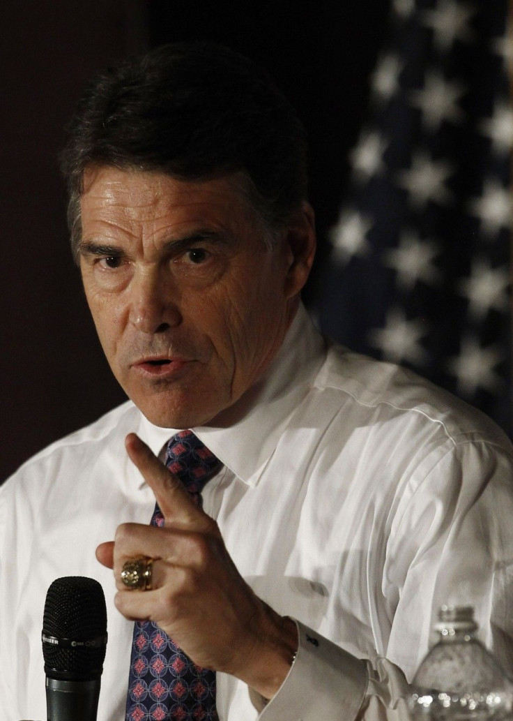 U.S. Republican presidential candidate Texas Governor Rick Perry speaks at the Republicans of Black Hawk County Dinner in Waterloo, Iowa