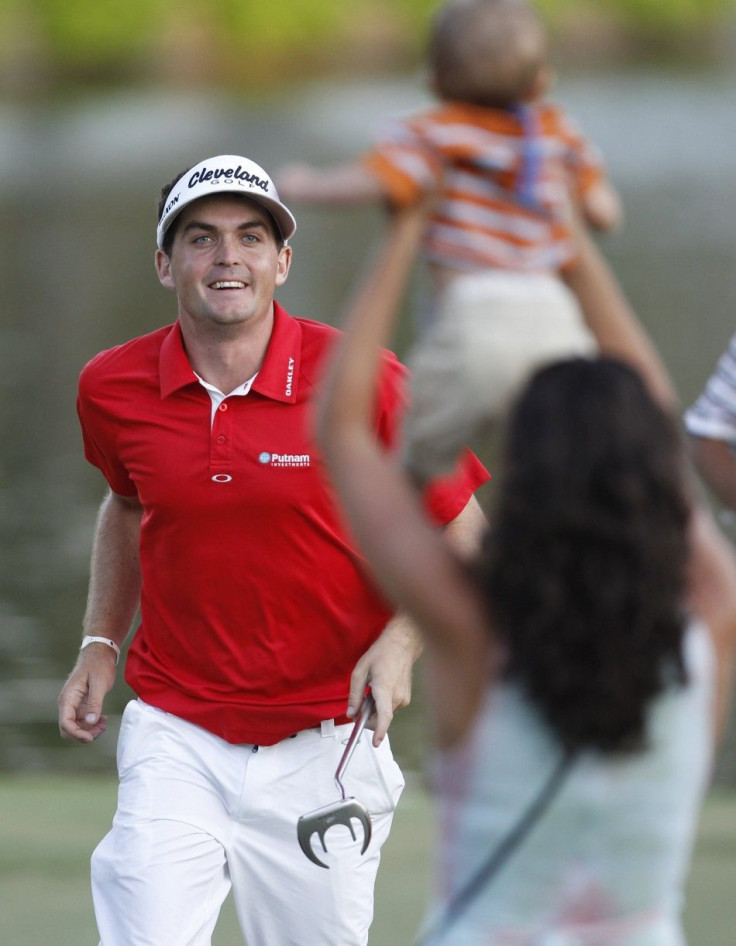 Bradley runs to greet his sister and his nephew after he won the PGA Championship golf tournament at the Atlanta Athletic Club in Johns Creek