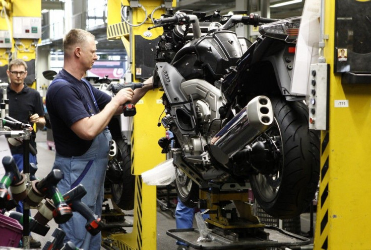 A BMW employee assembles a BMW motorcycle at the company's factory in Berlin