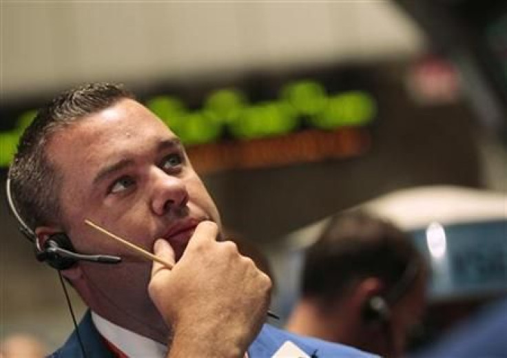 Traders work on the floor of the New York Stock Exchange