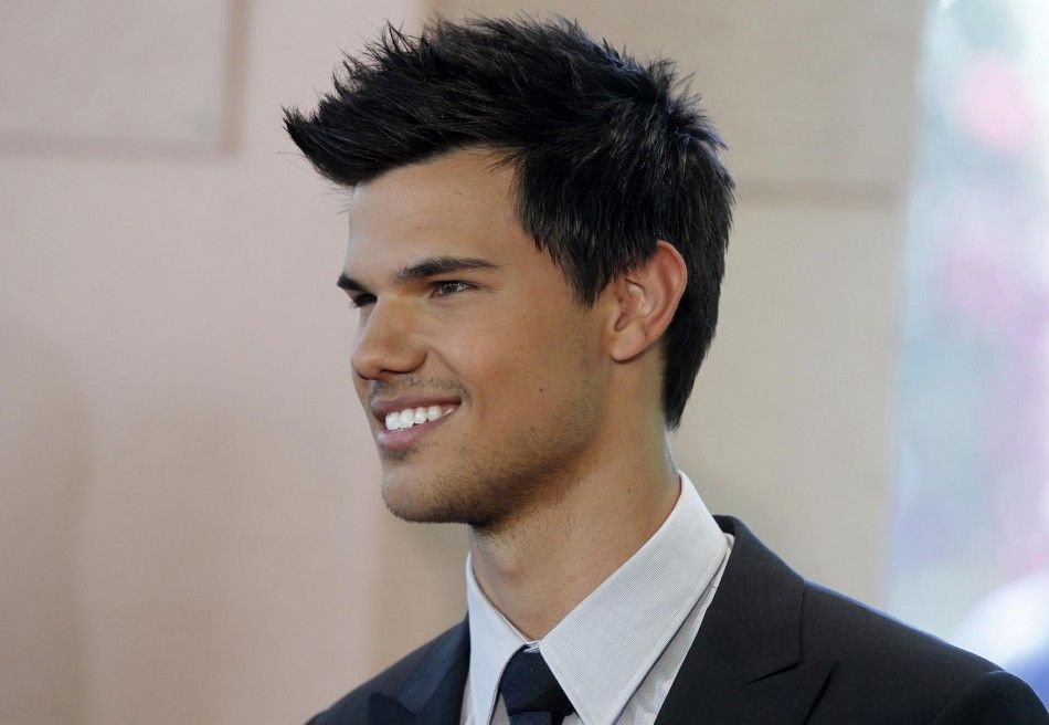Actor Taylor Lautner arrives at the Hollywood Foreign Press Association annual installation luncheon in Beverly Hills.
