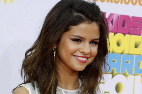 Actress Selena Gomez poses at the 2011 Nickelodeon Kids Choice Awards in Los Angeles.