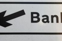 Directions to the Bank district are seen on a sign in the City of London