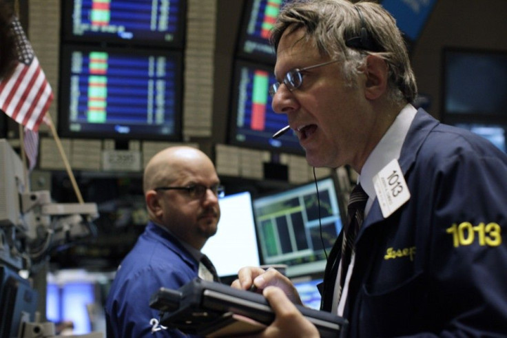 Traders work on the floor of the New York Stock Exchange