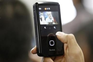 An interview with Roach is recorded on a Kodak Playtouch pocket video camera before a media workout for Pacquiao in Los Angeles
