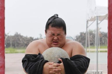 Japanese Sumo Wrestlers Back to Training After Deadly Earthquake Tsunami (PHOTOS)  