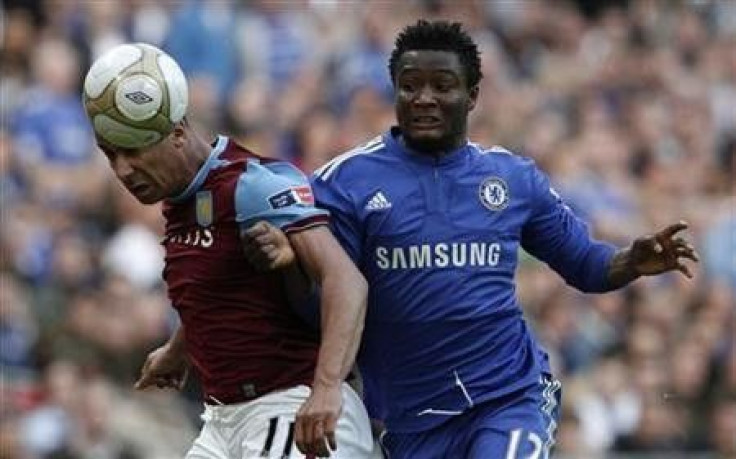 Chelsea&#039;s John Obi Mikel (R) challenges Aston Villa&#039;s Gabriel Agbonlahor during their FA Cup semi-final soccer match at Wembley Stadium in London